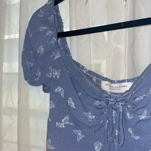 blue butterfly blouse